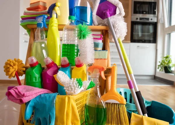 Close Cleaning Products Arranged Wooden Shelves Front Kitchen Housekeeping Concept — Zdjęcie stockowe