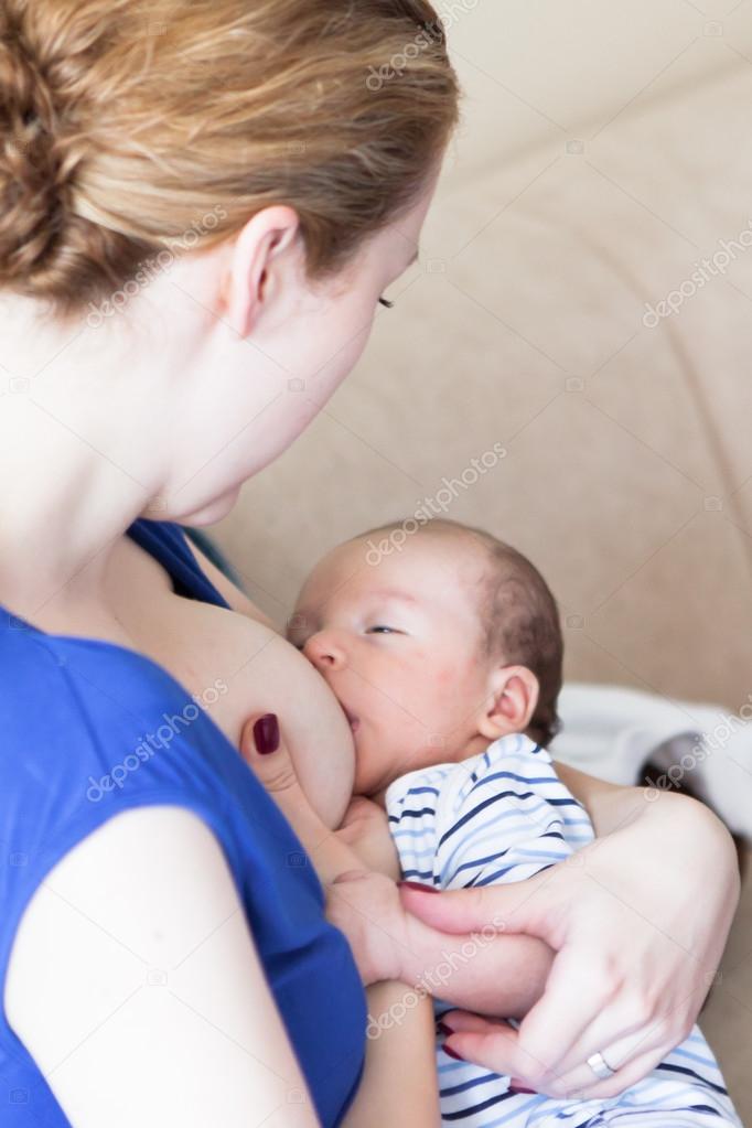 Newborn baby breast feeding