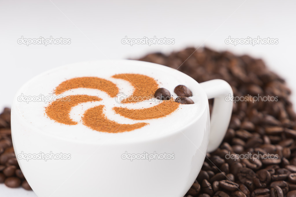 Capuccine with coffee beans