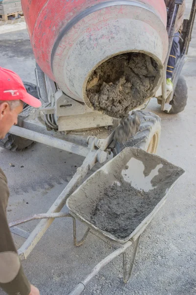 Pouring to wheel barrow 2 — Stock Photo, Image