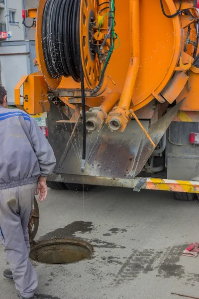 Sewer tanker, nozzle tip on jet hose — Stock Photo, Image