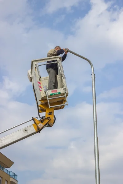 Line installer, install and fix cables and wires — Stock Photo, Image