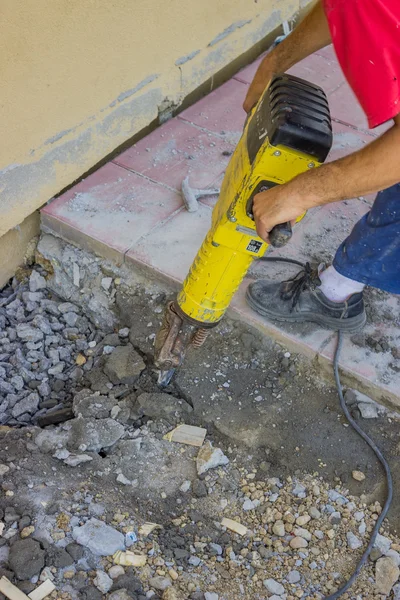 Builder worker with electric jackhammer 4 — Stock Photo, Image