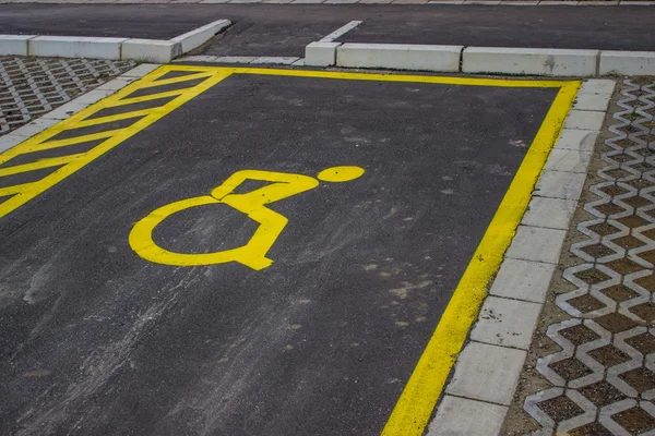 Handicap symbol painted on asphalt at parking space 2 — Stock Photo, Image