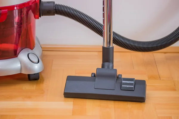 Vacuum cleaner power head on the floor — Stock Photo, Image