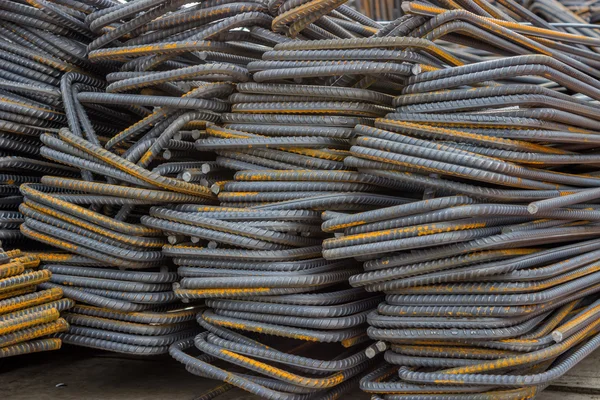 Stack of steel reinforcement bars background — Stock Photo, Image