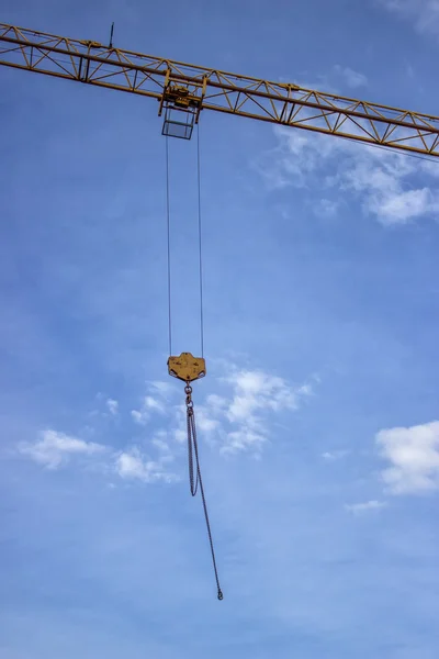 Yellow Crane hook on steel cables with chains — Stock Photo, Image