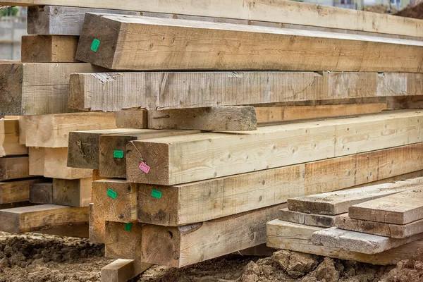 Stacked wooden beam as a building material — Stock Photo, Image