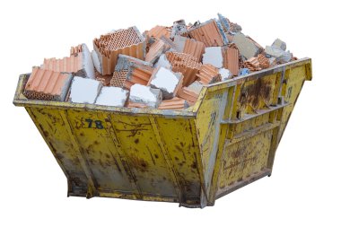 construction waste container full of material from demolished wa clipart