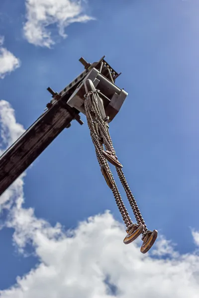 Chains with hooks on heavy truck crane — Stock Photo, Image