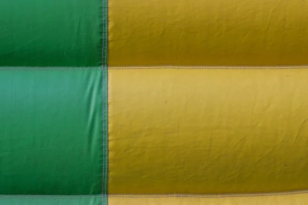 Fond jaune vert de détail de bâche de PVC — Photo