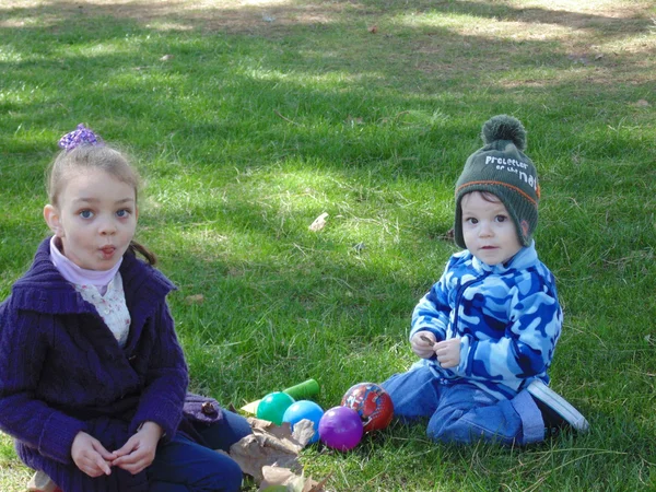 Funny sister and brother  in the park  4. — Stock Photo, Image