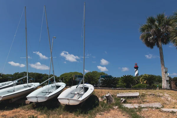 Sailboats on beach near St Augustine Lighthouse in Saint Augustine, Florida