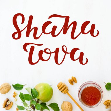 Bal, elma ve ceviz beyaz ahşap arka planda