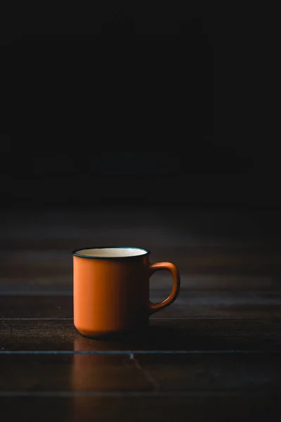 Orange Ceramic Coffee Cup Wooden Table Dark Background Vintage Tone — Stockfoto