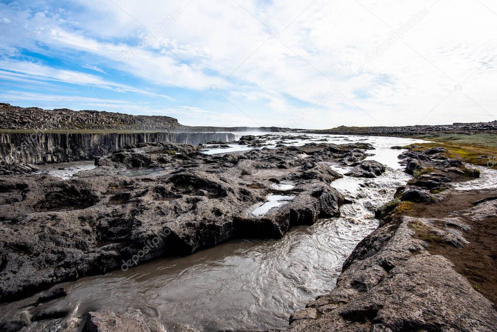 Dettifoss is a spectacular waterfall 45 meters high and 100 meters wide located in a completely deserted lunar landscape and boasts the title of waterfall with the largest water flow in Europe in the heart of the desert area of north-eastern Iceland