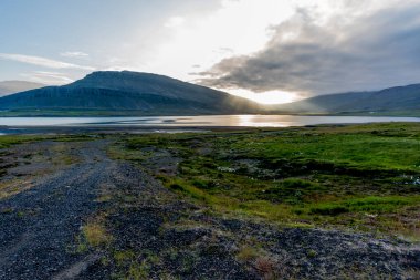 sunrise over the fjord at Borgarfjordur between Eystri mountains in eastern Iceland