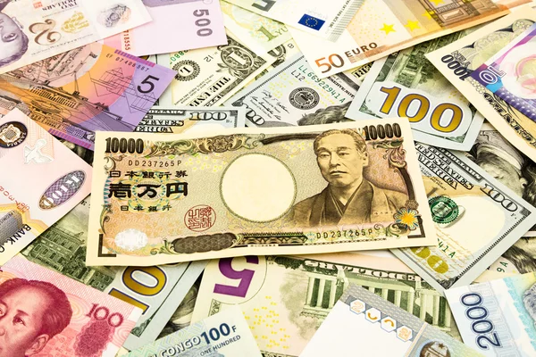 Japan en wereld munt geld bankbiljetten — Stok fotoğraf