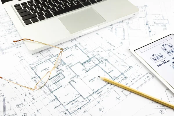 House blueprints and floor plan with notebook — Stock Photo, Image