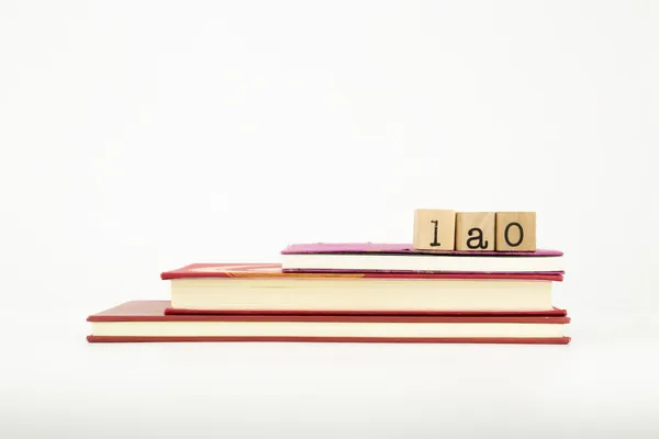 Lao palabra del idioma en sellos y libros de madera —  Fotos de Stock