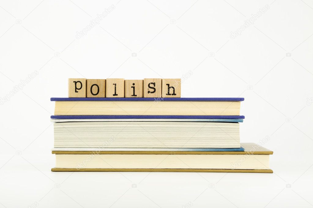 polish language word on wood stamps and books
