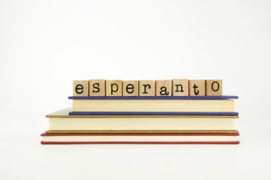 esperanto language word on wood stamps and books clipart
