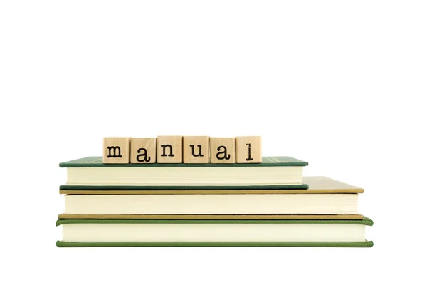 Handmatige woord op hout stempels en boeken — Stockfoto