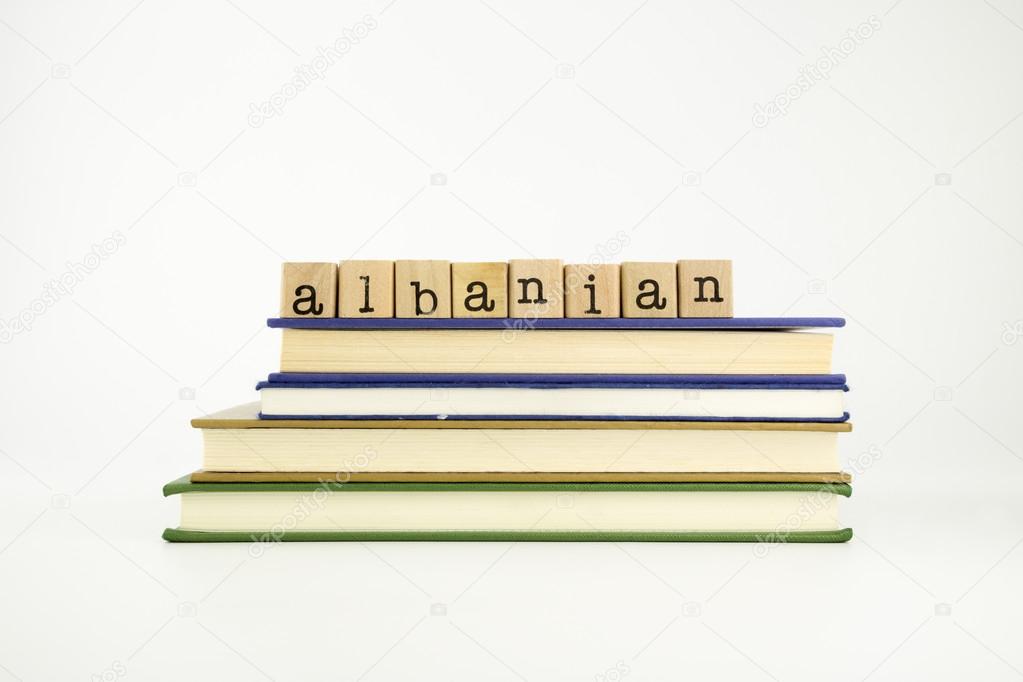 Albanian language word on wood stamps and books