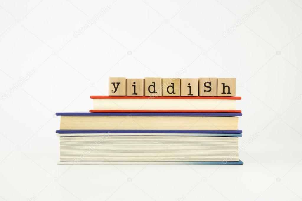 Yiddish language word on wood stamps and books