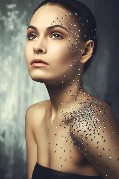 Beautiful young girl with crystals on the body — Stock Photo, Image