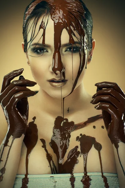 Girl in chocolate — Stock Photo, Image
