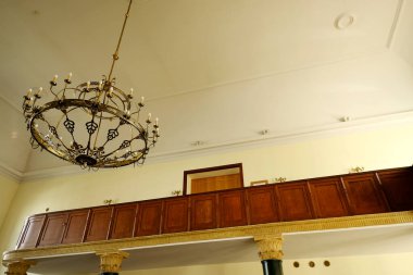 Lublin, Poland. 10 August 2022. Interior of syangogue at Chachmei Lublin Yeshiva - view on the candelabre and women's gallery