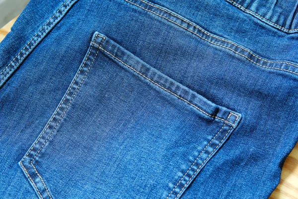 Zbliżenie Niebieskie Dżinsy Tylna Kieszeń Dżinsowe Tło — Zdjęcie stockowe