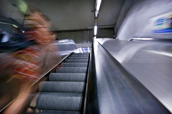 People walk at subway station abstract blur — Stockfoto