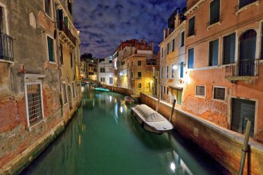 Venice canal at night clipart