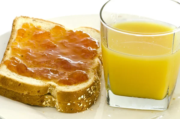 Ψωμί με μαρμελάδα και το χυμό — Φωτογραφία Αρχείου