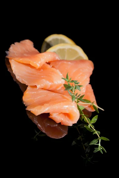 Culinary seafood. Salmon isolated on black. — Stok fotoğraf