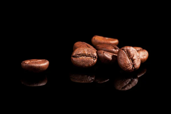 Luxurious coffee beans on black. — Stock Photo, Image