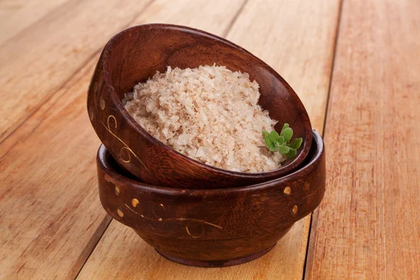 Natural salt crystal in wooden oriental bowl. — Stock Photo, Image