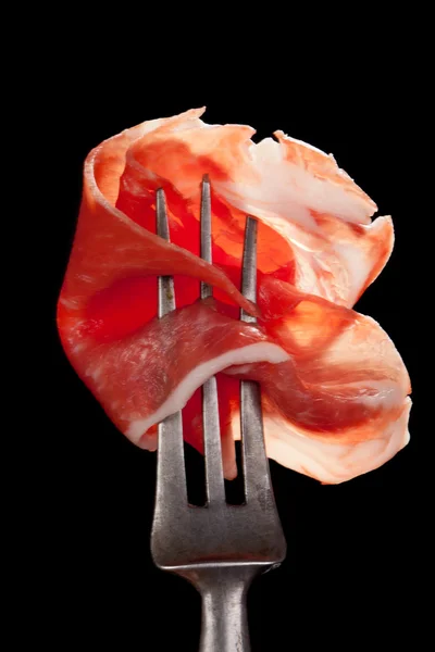 Parma ham detail on fork. — Stock Photo, Image