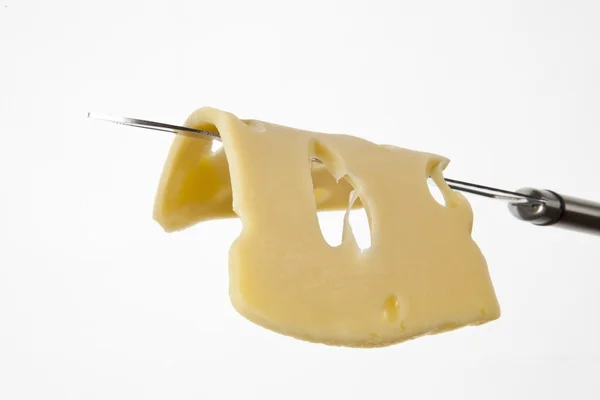 Cheese slice on knife. — Stock Photo, Image