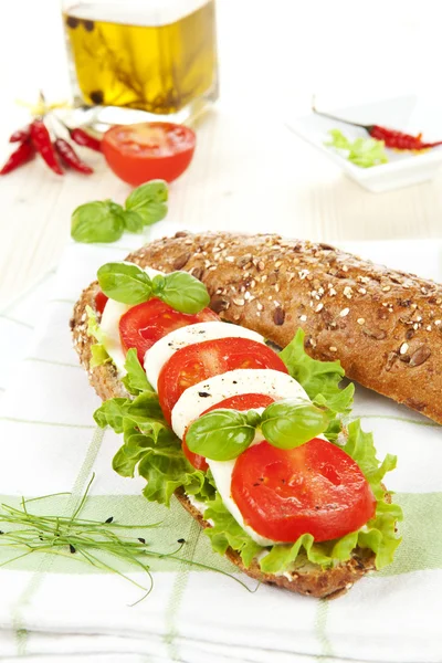 Mozzarella tomato baguette. — Stock Photo, Image