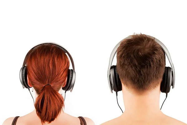 Paar mit Kopfhörer. zurück. — Stockfoto