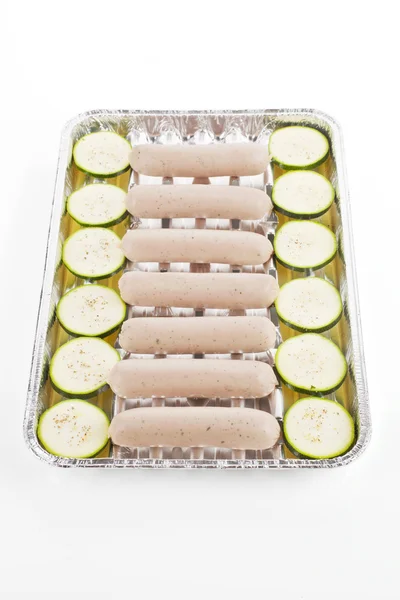 Bratwurst on grill tray. — Stock Photo, Image