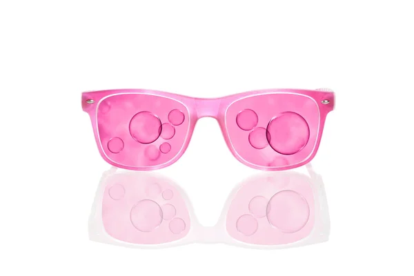 Se världen genom rosa färgade glasögon. — Stockfoto