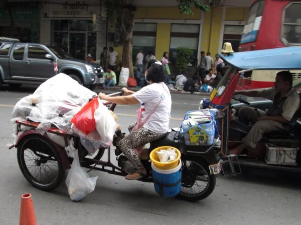 A recycle garbage-cart on street 스톡 사진