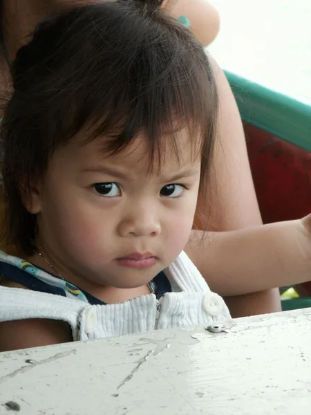 Little girl with doubtful face — Stok Foto