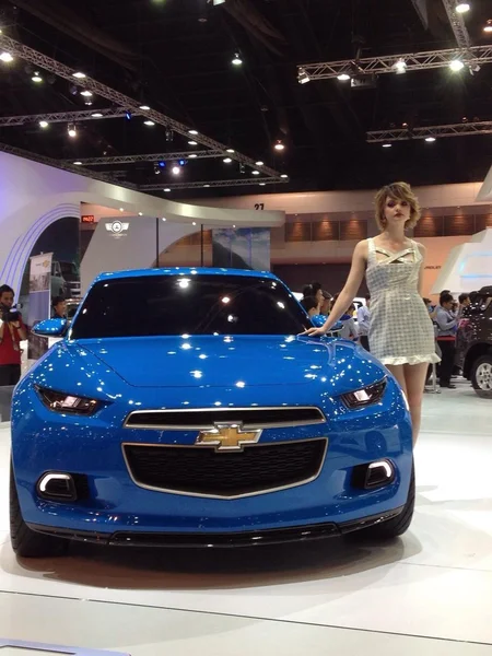 A blue Chevrolet with unidentified model on white dress — Stock Photo, Image