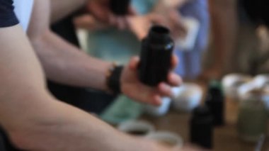 close-up view of a man holding a coffee cup. people, technology, internet and medicine concept