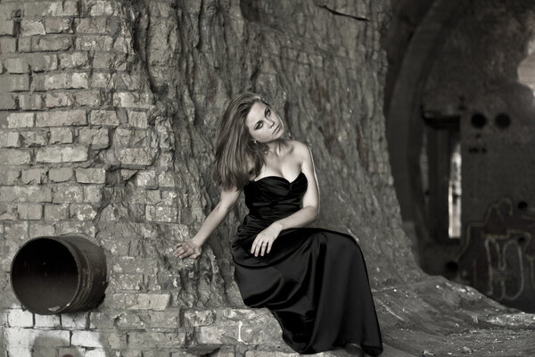 Beautiful girl in a black evening dress